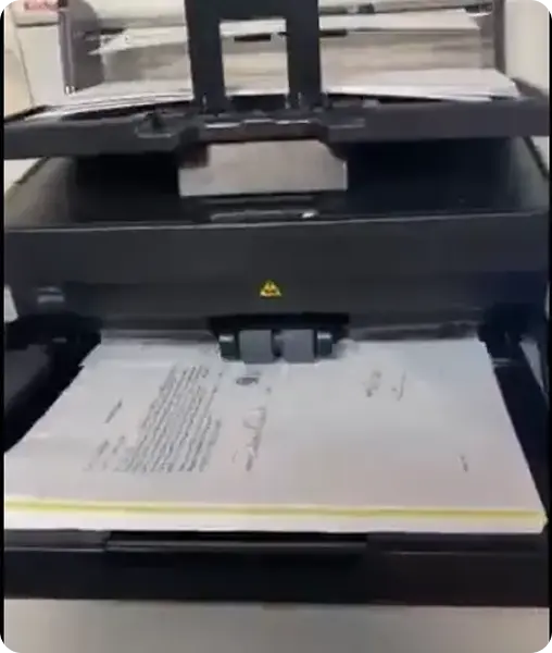 High-speed document scanner processing legal files for digitization in SF Bay Area